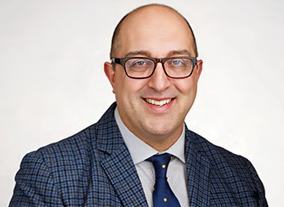 Dr. Christopher Smolock, vascular surgeon at the Cleveland Clinic, in a professional portrait.