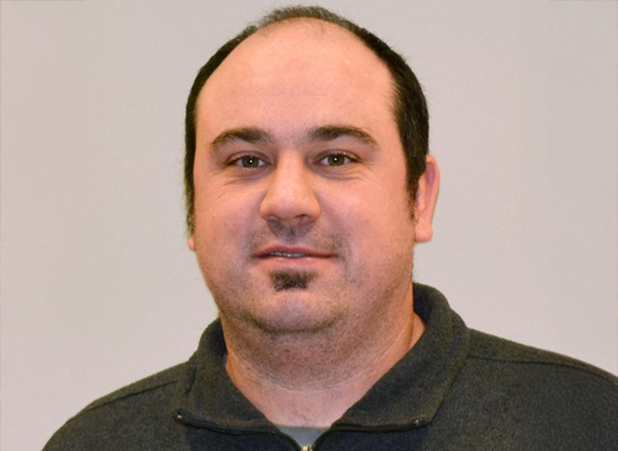 Dr. John R. Teijaro, immunologist and associate professor at the Scripps Research Institute, in a professional portrait.
